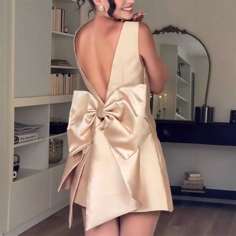 RITA - Gold Satin Holiday Mini Dress with Statement Bow